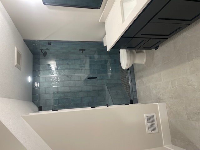 Modern bathroom renovation by Garrett Construction