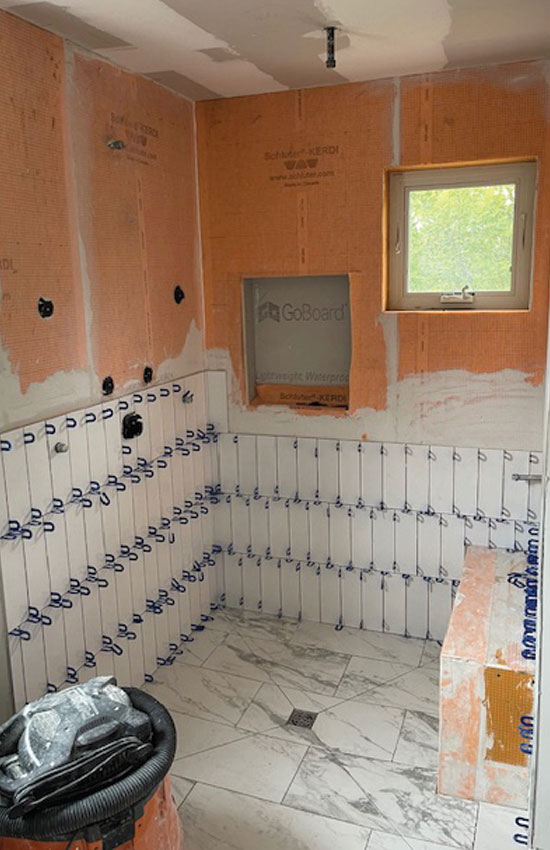 Savage master bathroom before renovation - dated bathroom fixtures and layout
